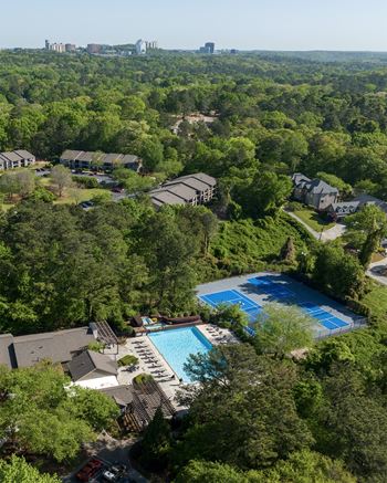 a view of the pool and grounds from the top of the house